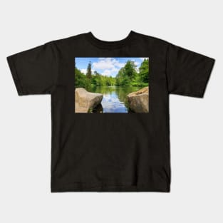 Beautiful pond view with birds going around Kids T-Shirt